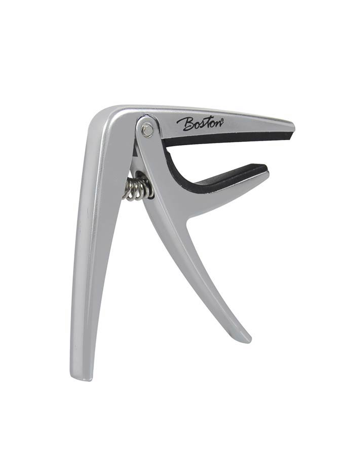 Spring loaded capo for acoustic or electric guitar, titanium